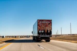 Colorado Denver area with Interstate 70 highway and JM Bozeman Enterprises truck